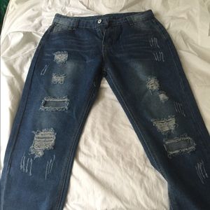 Distressed woman's jeans